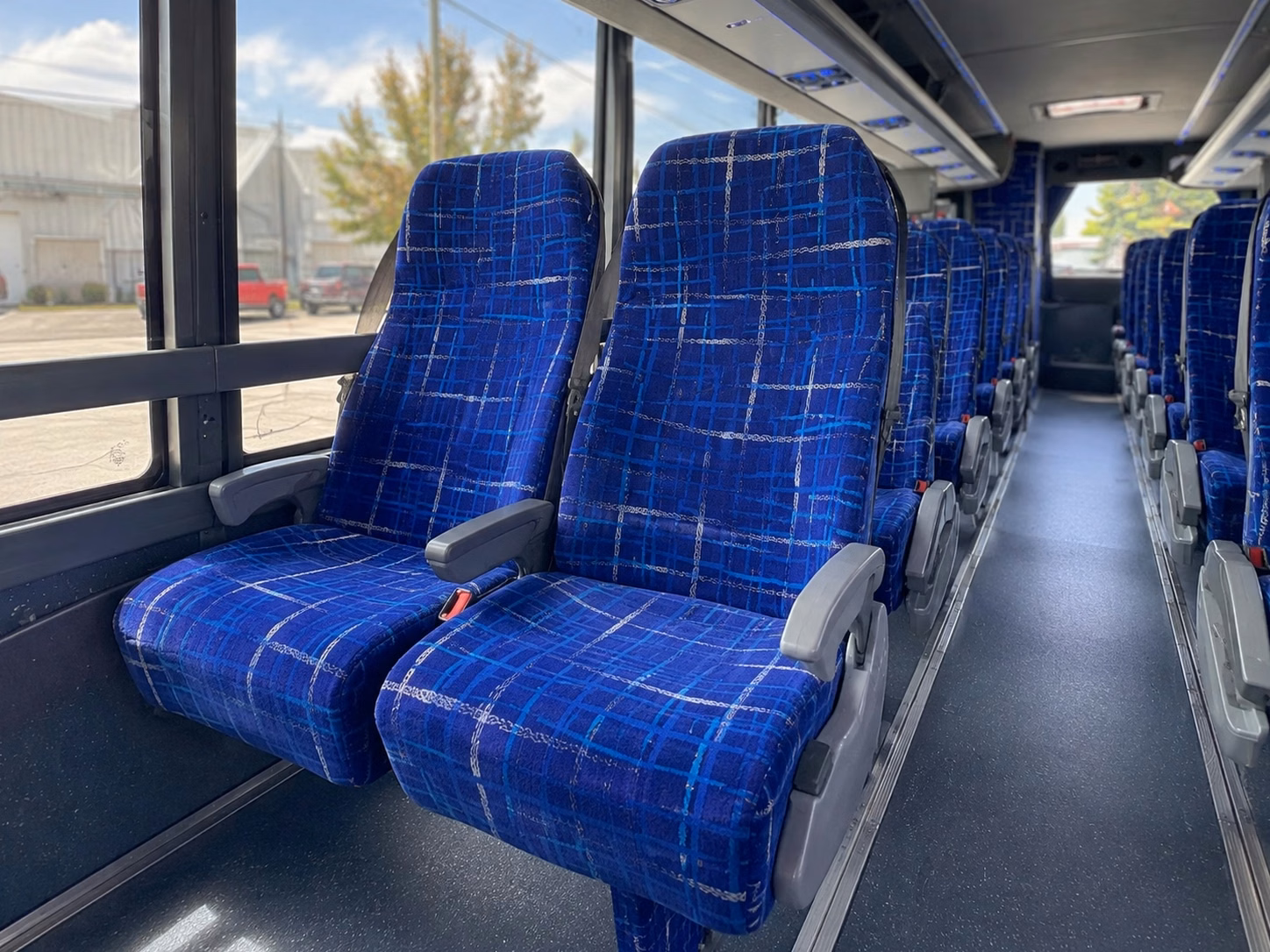 high school sports fan buses and athletic department shuttles in ann arbor